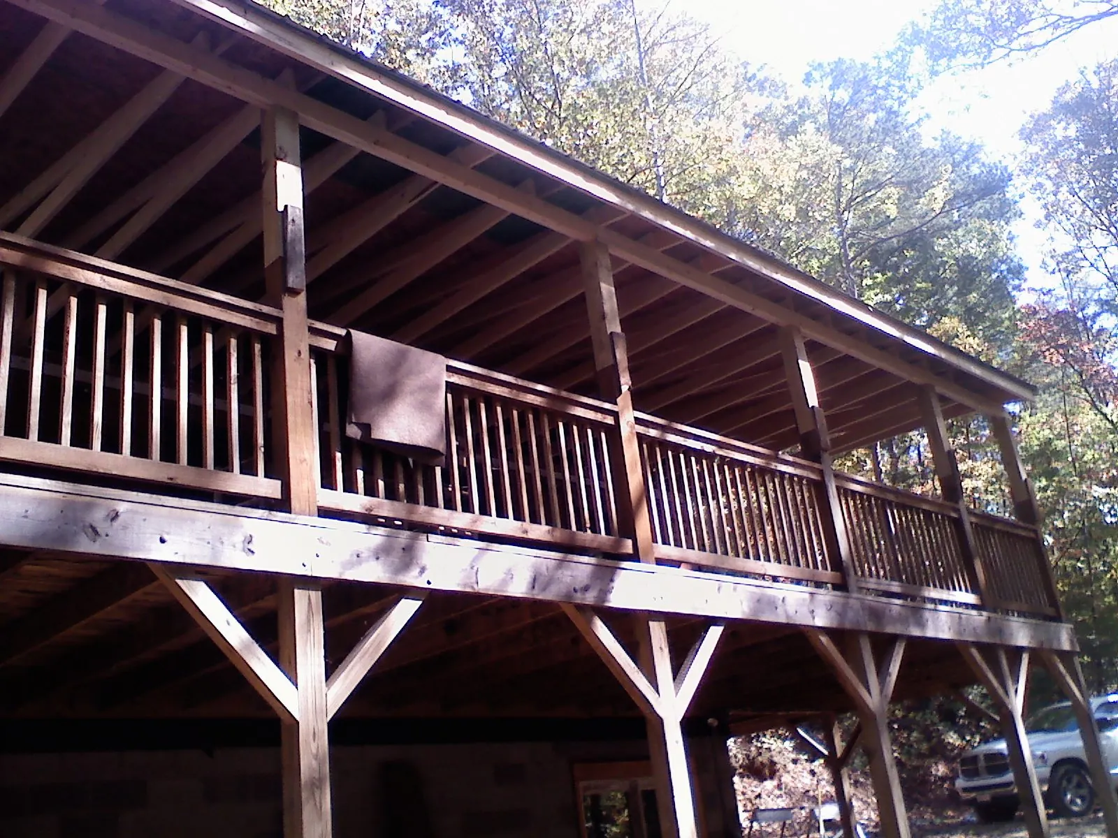Timber framing under a new elevated porch and deck — Roof Leak Repair in Elgin by Roofing Brothers